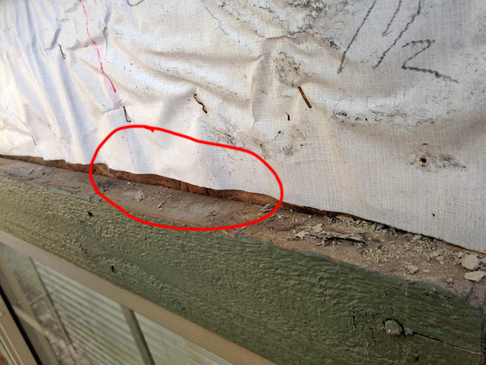 improperly installed house wrap by a local flagstaff contractor