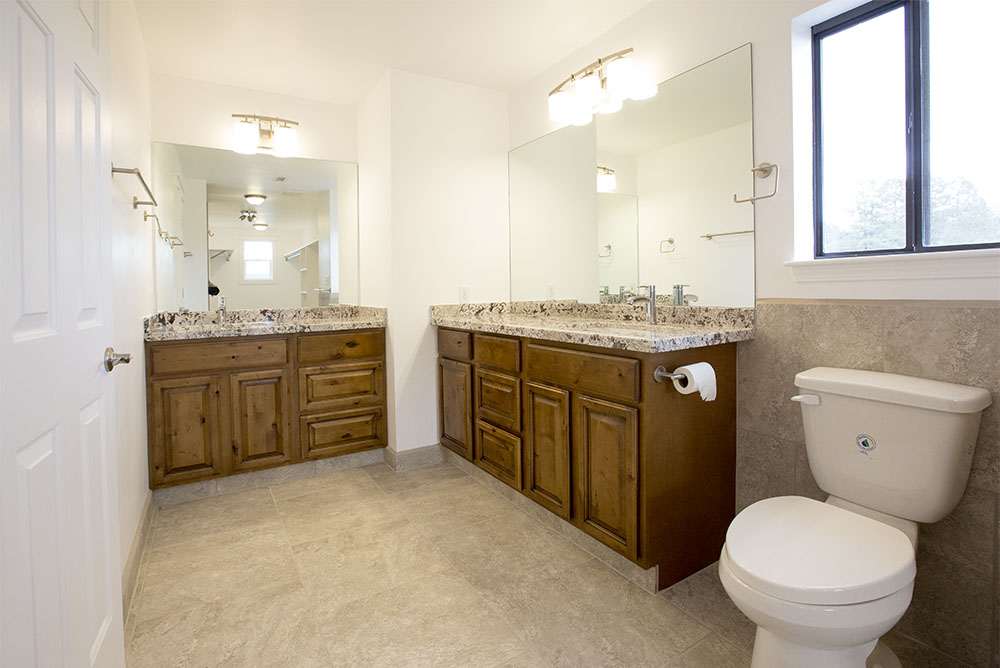 New Master Bathroom with granite counters and Rustic Tuscany style cabinets
