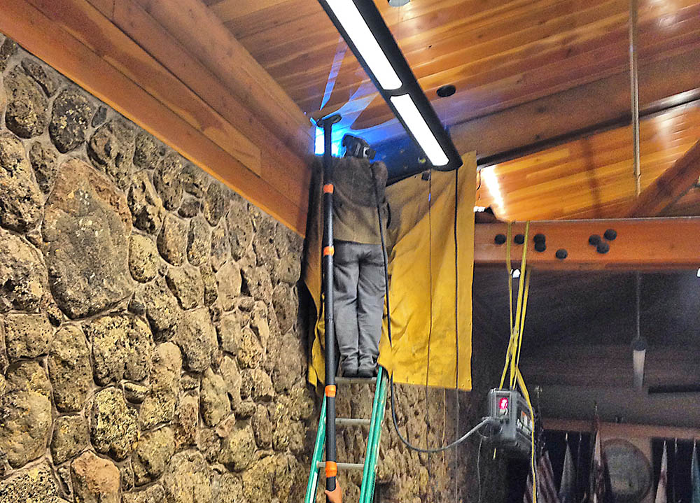 Welding new truss plates to existing beam brackets at Flagstaff City Hall