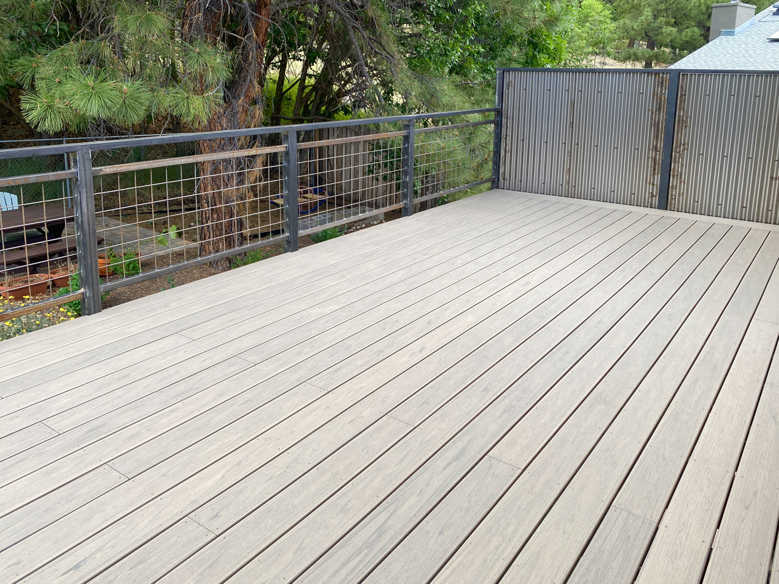 Composite deck with privacy railing on one side in Flagstaff AZ