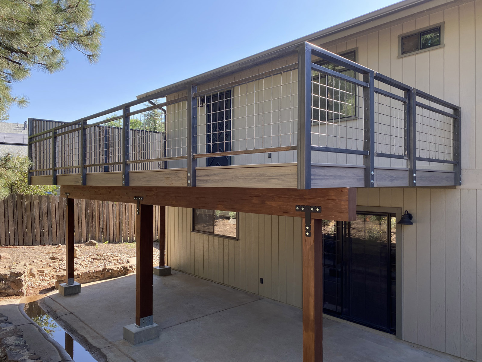 2nd story Trex deck with metal railing and privacy screen in Flagstaff AZ