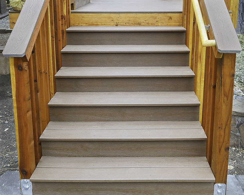 Deck stairs made from Trex Transcends decking and Redwood railings