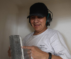 Dustless drywall or sheetrock sanding