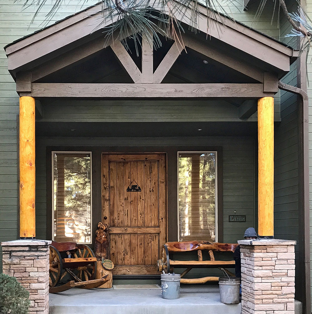 Repairing wood posts and stone work on a porch in Forest Highlands Golf Club