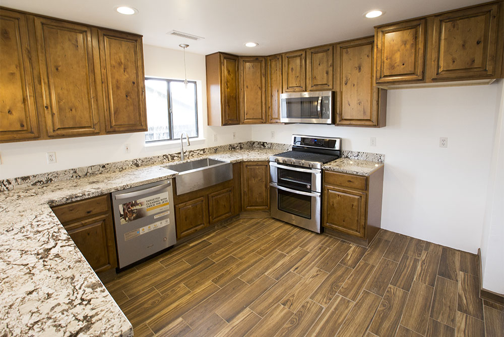 Kitchen remodel with Sollid Cabinetry cabinets in Rustic Tuscany and Level 3 Granite