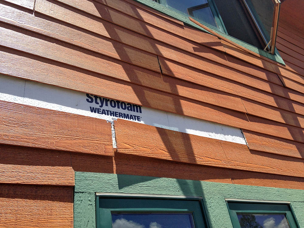 HardiePlank brand siding wind damage near Flagstaff AZ