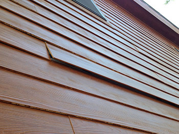 improperly installed hardi-plank lap siding by 'the other guys'